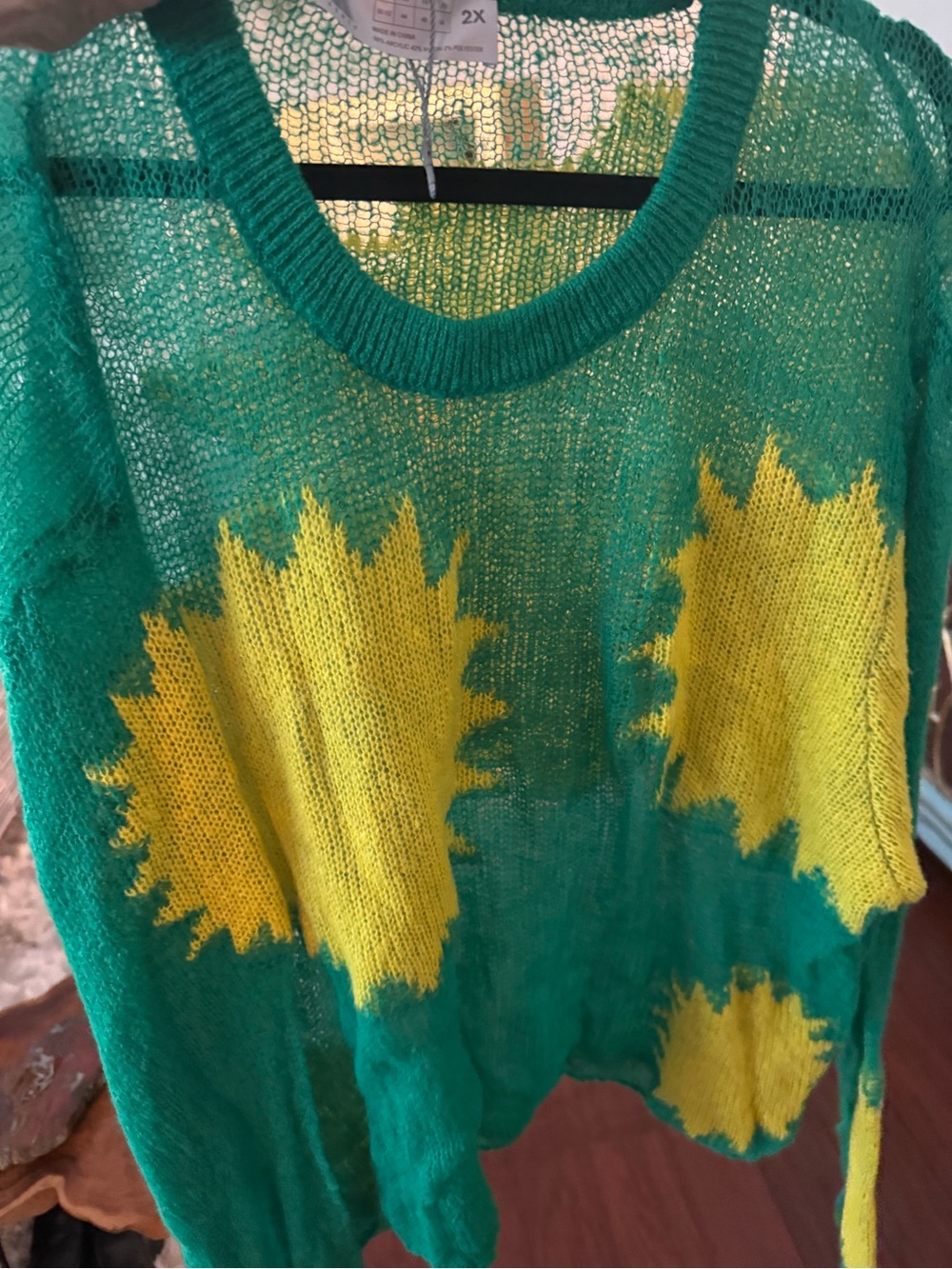 Savage X Fenty Green Crewneck Sweater with Yellow Sunburst Motifs